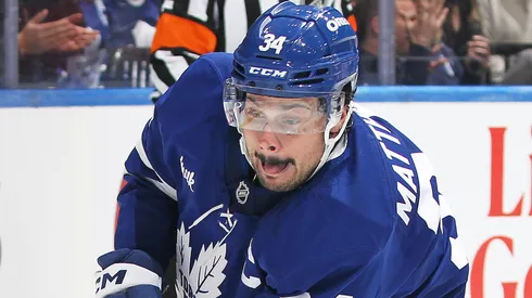 Auston Matthews leads the Maple Leafs on the ice.