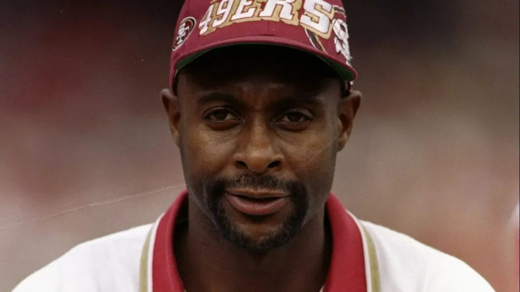 Jerry Rice of the San Francisco 49ers looks on during a game against the New Orleans Saints in 1977. (Source: Todd Warshaw /Allsport)