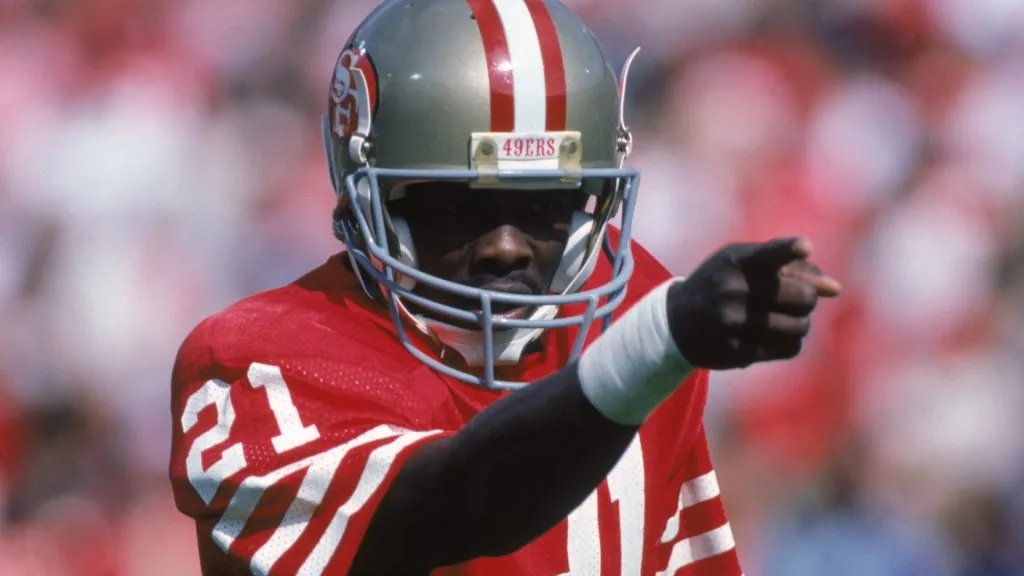 Eric Wright #21 of the San Francisco 49ers points across the field against the New Orleans Saints during a game in 1985. (Source: George Rose/Getty Images)