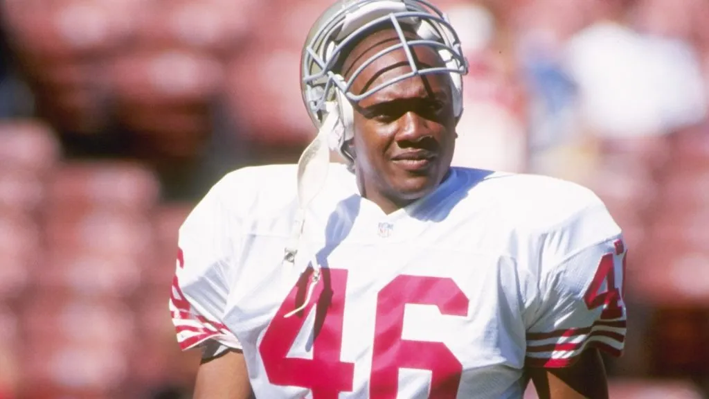 Tim McDonald of the San Francisco 49ers looks on during a preseason game in 1995. (Source: Otto Greule Jr. /Allsports)