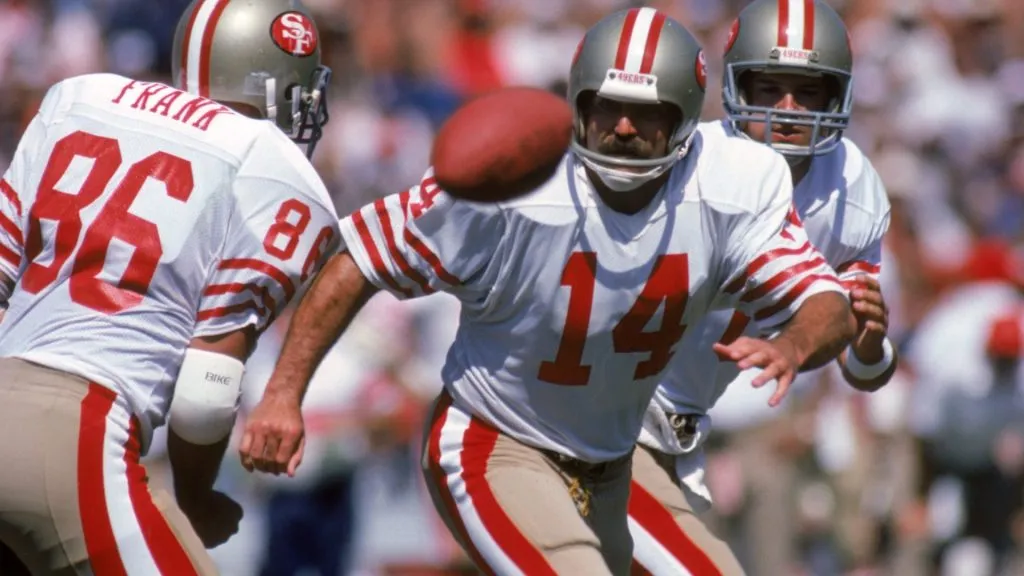 Ray Wersching #14 of the San Francisco 49ers goes after the ball after a blocked field goal attempt during a game in 1985. (Source: George Rose/Getty Images)