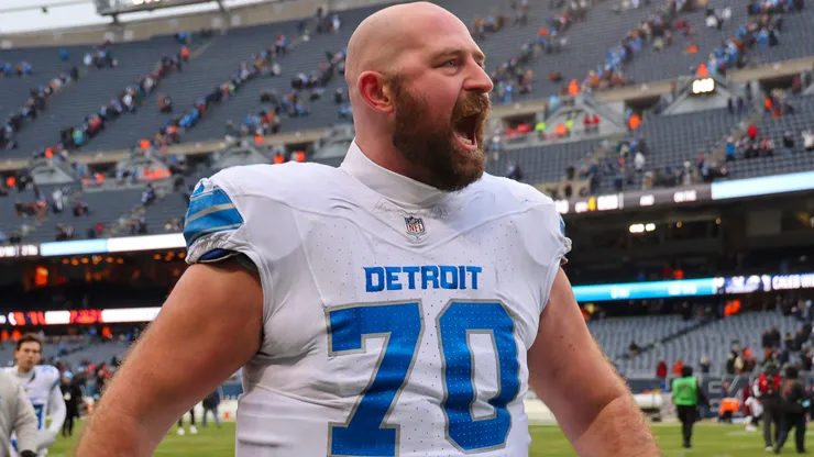 Dan Skipper #70 of the Detroit Lions celebrates after his team defeated the Chicago Bears.