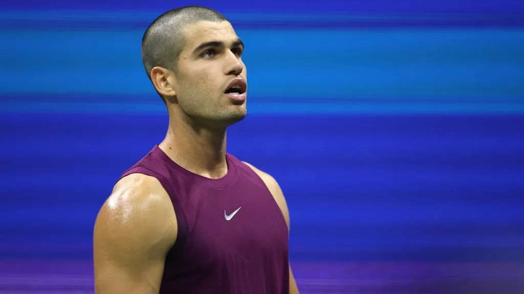 Carlos Alcaraz reacts against Reilly Opelka during the 2025 US Open. (Elsa/Getty Images)