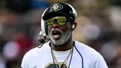 Head coach Deion Sanders of the Colorado Buffaloes walks on the field.