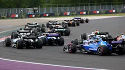 F1 drivers battling in Hungary Grand Prix.