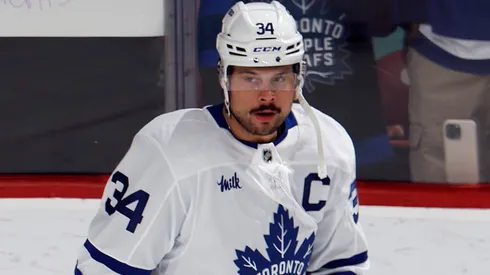 Auston Matthews #34 of the Toronto Maple Leafs skates during an NHL game.