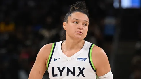 Kayla McBride #21 of the Minnesota Lynx reacts after a basket against the Seattle Storm.