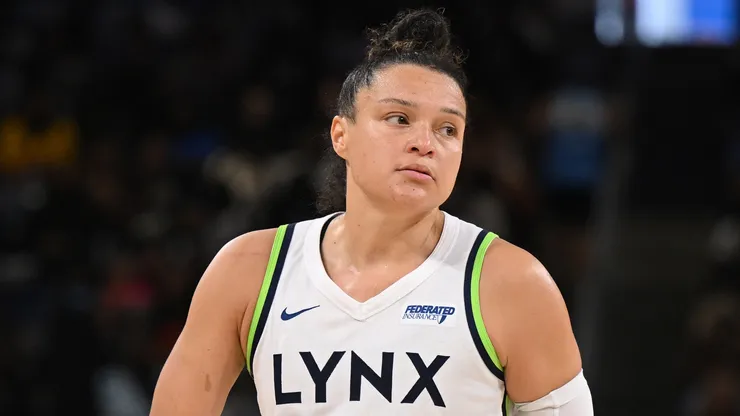 Kayla McBride #21 of the Minnesota Lynx reacts after a basket against the Seattle Storm.