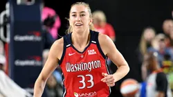 Lucy Olsen #33 of the Washington Mystics celebrates in the third quarter against the Indiana Fever in 2025.