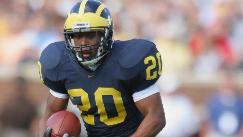 Mike Hart #20 of the Michigan Wolverines runs the ball against the Northern Illinois Huskies during a game in 2005. (Source: Tom Pidgeon/Getty Images)