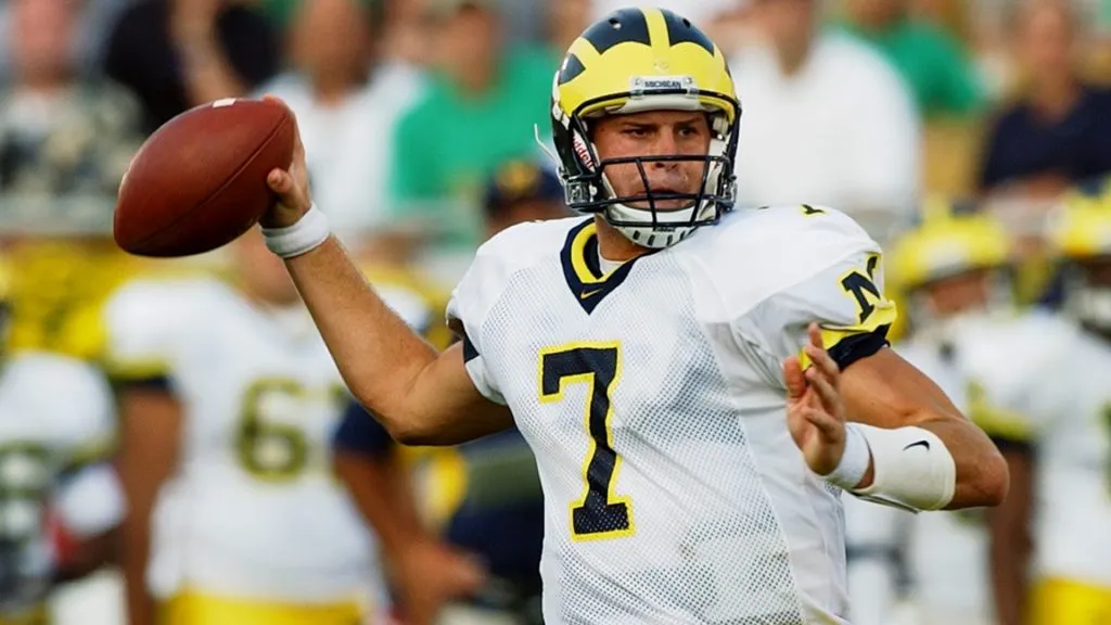 Chad Henne #7 of the Michigan Wolverines drops back to pass during the game with the Notre Dame Fighting Irish in 2004. (Source: Jonathan Daniel/Getty Images)