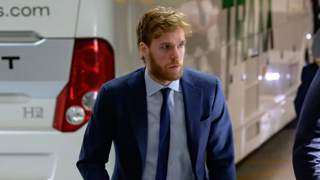 Connor McDavid walks into an arena