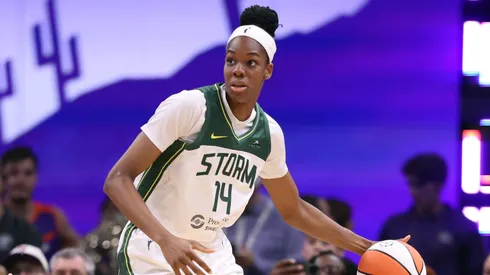 Dominique Malonga #14 of the Seattle Storm posts up on Alyssa Thomas #25 of the Phoenix Mercury during the first half in 2025.