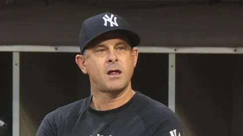Aaron Boone looks on in an MLB game.
