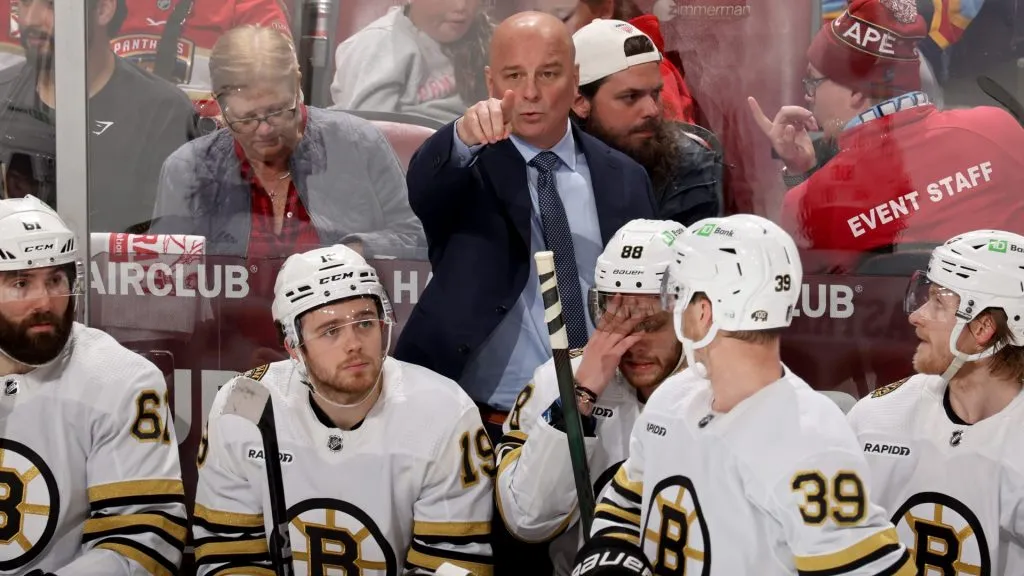 Jim Montgomery is seen on the bench with the Boston Bruins. (Photo by Joel Auerbach/Getty Images)