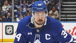 Auston Matthews #34 of the Toronto Maple Leafs skates during an NHL game.