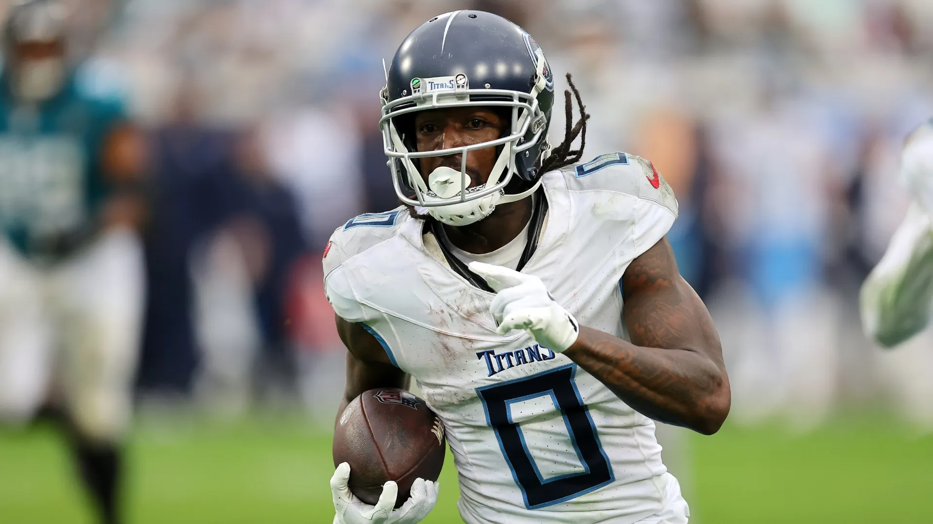 Calvin Ridley #0 of the Tennessee Titans runs after a catch