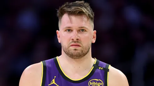 Luka Doncic #77 of the Los Angeles Lakers looks on during an NBA game.