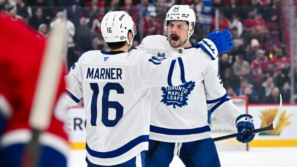 Auston Matthews celebrates his goal with former teammate Mitch Marner. (Photo by Minas Panagiotakis/Getty Images)
