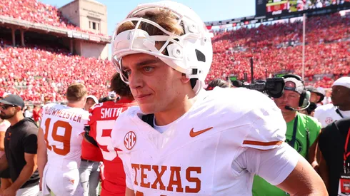 Arch Manning #16 of the Texas Longhorns leaves the field.