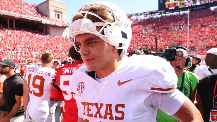 Arch Manning #16 of the Texas Longhorns leaves the field.