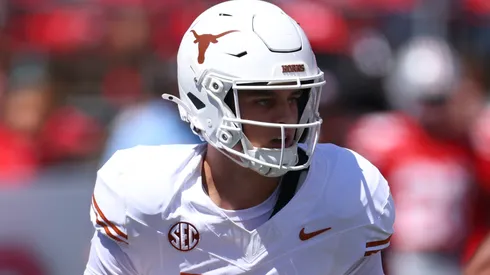 Arch Manning #16 of the Texas Longhorns throws a first half pass.