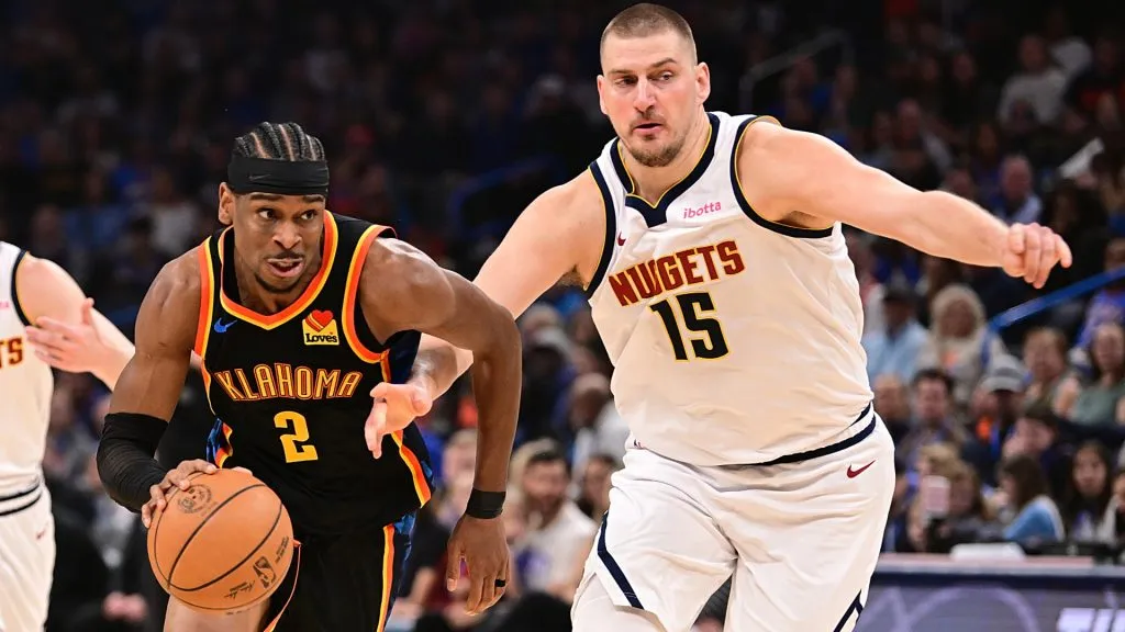 Shai Gilgeous and Nikola Jokic playing against each other