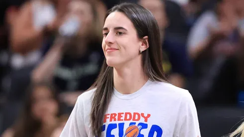 Caitlin Clark #22 of the Indiana Fever looks on against the Dallas Wings.