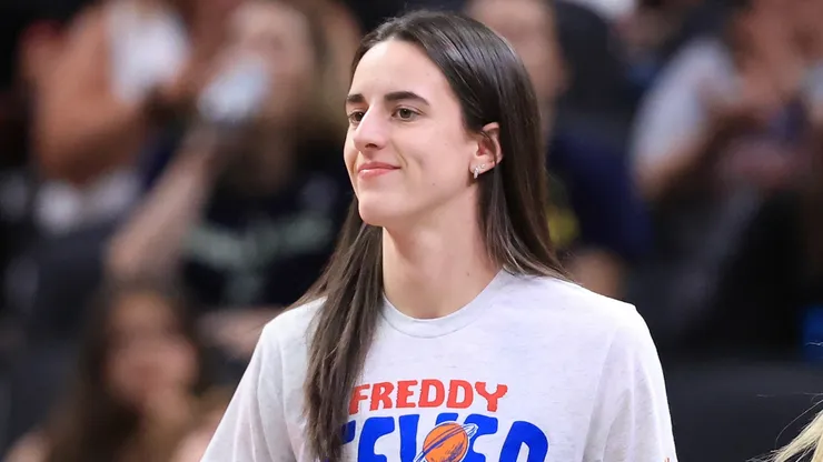 Caitlin Clark #22 of the Indiana Fever looks on against the Dallas Wings.