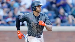 Juan Soto #22 of the New York Mets watches the flight of his sixth inning two-run home run.