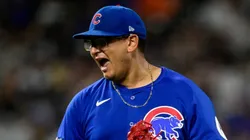 Javier Assad #72 of the Chicago Cubs celebrates after a strikeout.