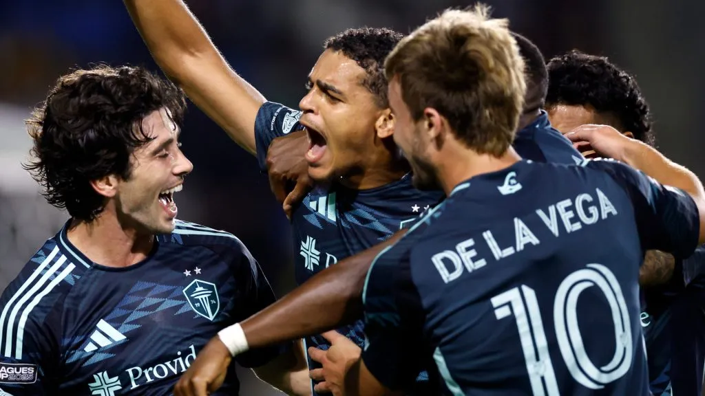 Seattle Sounders players celebrating a goal