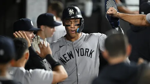 Aaron Judge #99 of the New York Yankees celebrates after scoring.