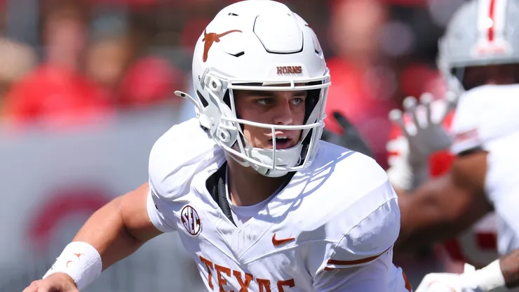 Arch Manning #16 of the Texas Longhorns throws a first half pass.