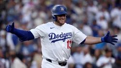 Max Muncy #13 of the Los Angeles Dodgers celebrates his home run.