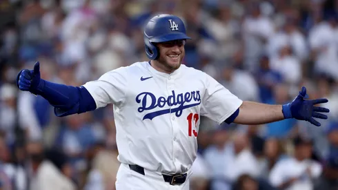 Max Muncy #13 of the Los Angeles Dodgers celebrates his home run.