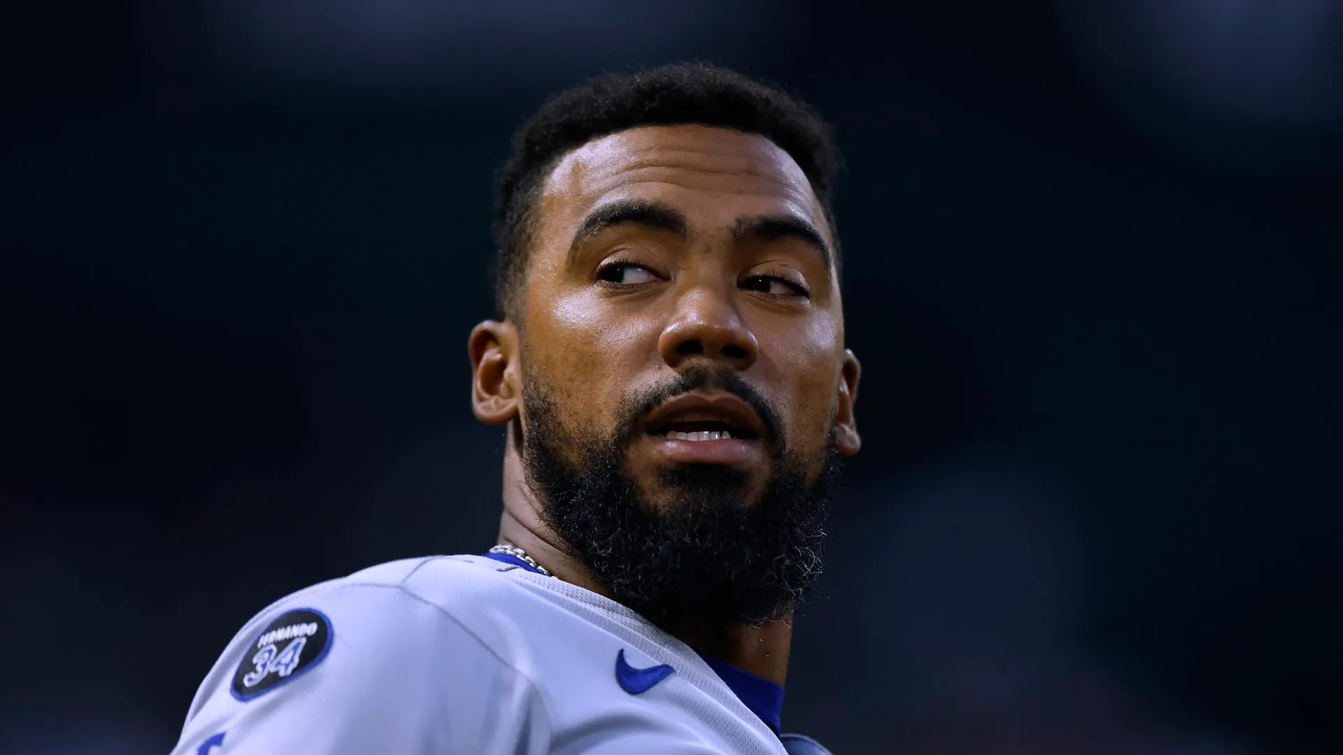 Teoscar Hernandez reacts in the dugout