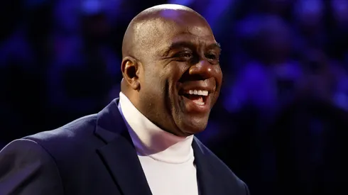 Earvin "Magic" Johnson reacts after being introduced as part of the NBA 75th Anniversary Team.