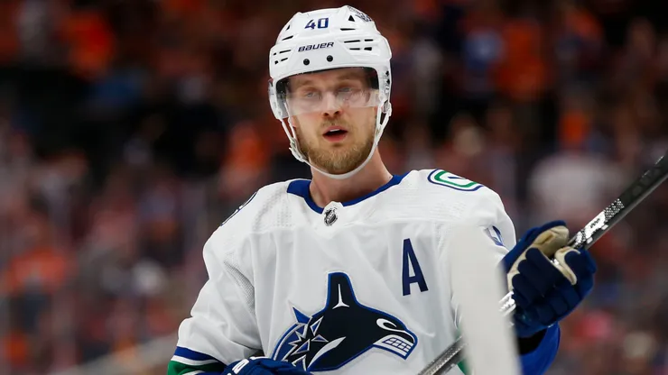 Elias Pettersson #40 of the Vancouver Canucks skates with the puck.