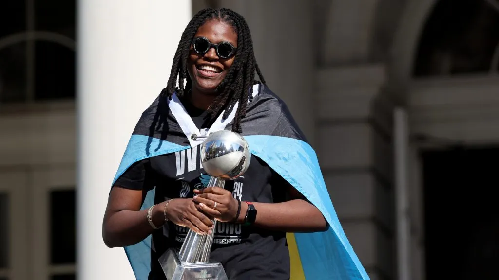 Jonquel Jones makes her entrance during the Championship ticker tape parade and victory rally celebrating winning the 2024 WNBA Finals. (Source: Elsa/Getty Images)