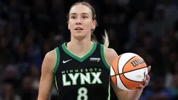 Alanna Smith #8 of the Minnesota Lynx dribbles up the court in the second quarter against the Dallas Wings in 2025.