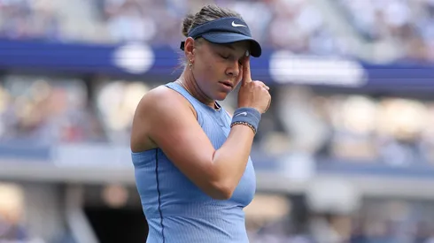 Amanda Anisimova of the United States reacts while playing against Iga Swiatek.