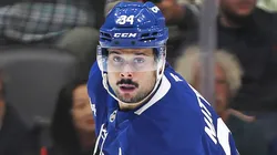 Auston Matthews controls the puck.