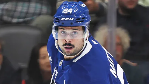 Auston Matthews controls the puck.