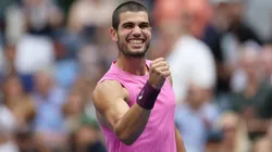 Carlos Alcaraz celebrates after defeating Novak Djokovic at the US Open semifinal.