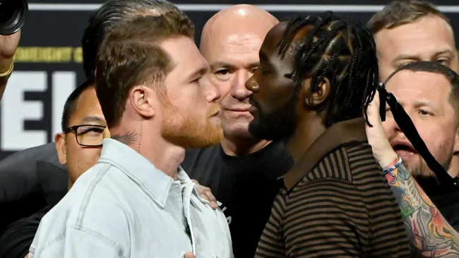 Canelo Alvarez, Dana White, and Terence Crawford are seen onstage during the Press Conference. (Photo by David Becker/Getty Images for Netflix)