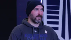 Alex Ovechkin holds a Bud Light prior to a press conference.