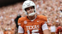 Arch Manning of the Texas Longhorns reacts after rushing for a touchdown.
