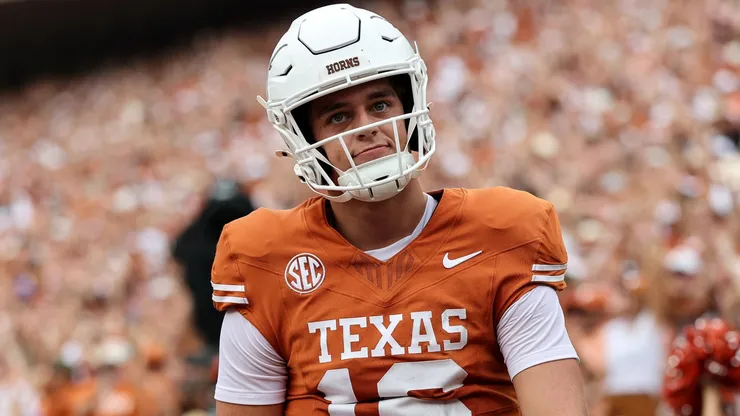Arch Manning of the Texas Longhorns reacts after rushing for a touchdown.