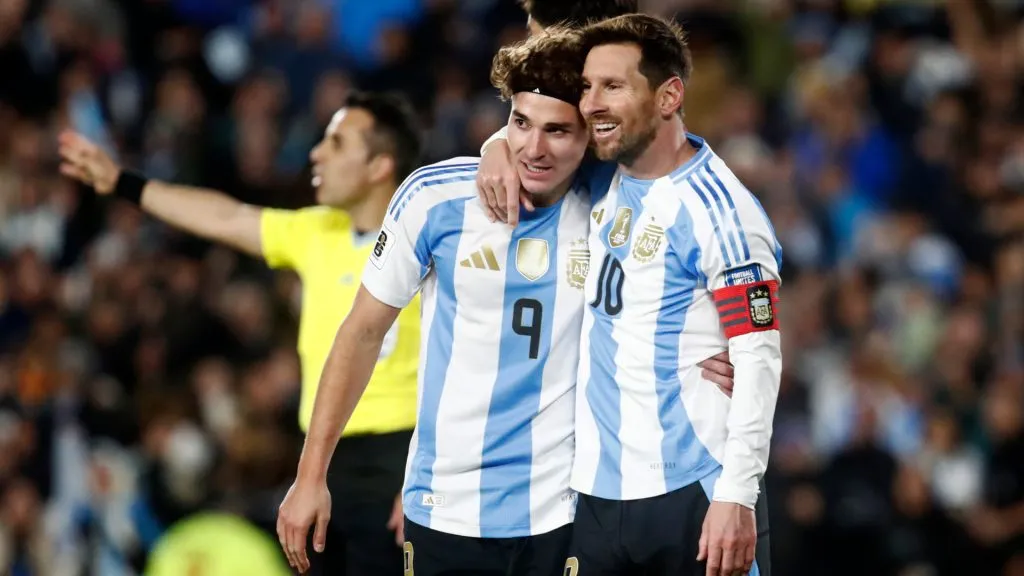Lionel Messi celebrates a goal with Julian Alvarez. (Marcos Brindicci/Getty Images)
